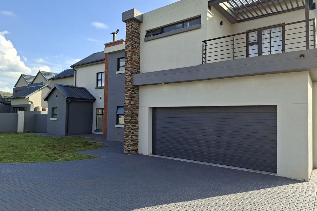 Modern Family Living with Space, Security & Scenic Views - Photo 2