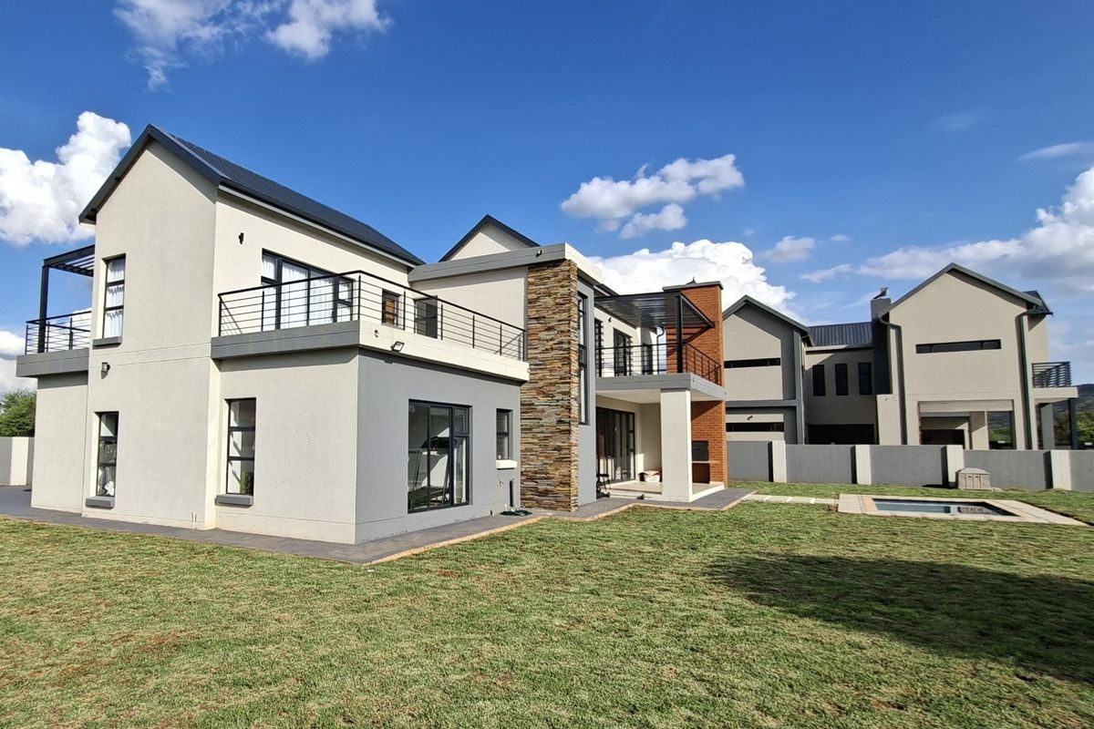 Modern Family Living with Space, Security & Scenic Views - Photo 3