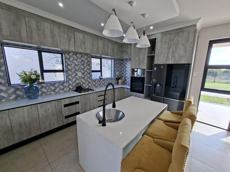 Modern Family Living with Space, Security & Scenic Views - Photo 9