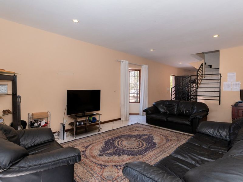 Modern & Secure 2-Bedroom Duplex with Stylish Living Spaces - Photo 1