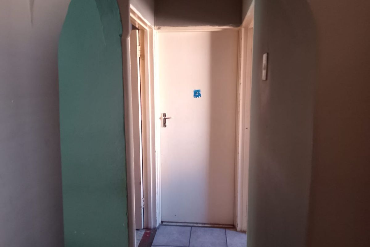 Secure 2 Bedroom Home with Garage and Great Potential - Photo 5