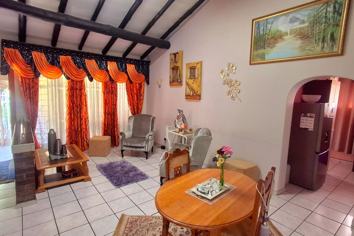 Spacious 4-Bedroom, 2-Bathroom Home with Entertainment Area and 1-Bedroom Flatlet – Sought-After Vaalpark - Photo 4