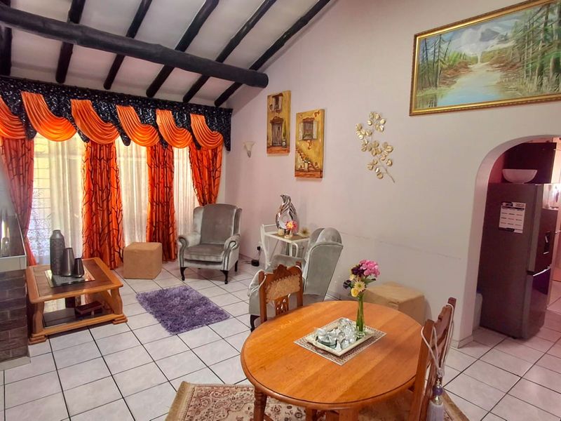 Spacious 4-Bedroom, 2-Bathroom Home with Entertainment Area and 1-Bedroom Flatlet – Sought-After Vaalpark - Photo 4