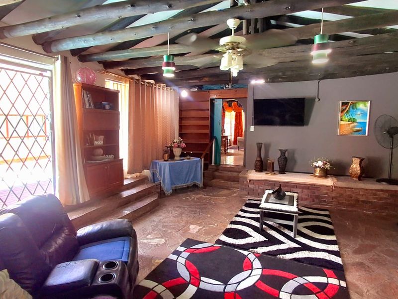 Spacious 4-Bedroom, 2-Bathroom Home with Entertainment Area and 1-Bedroom Flatlet – Sought-After Vaalpark - Photo 7