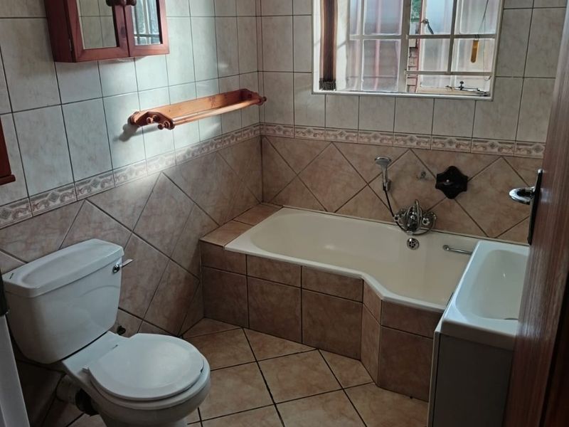 Spacious 4-Bedroom Family Home for Sale - Photo 6