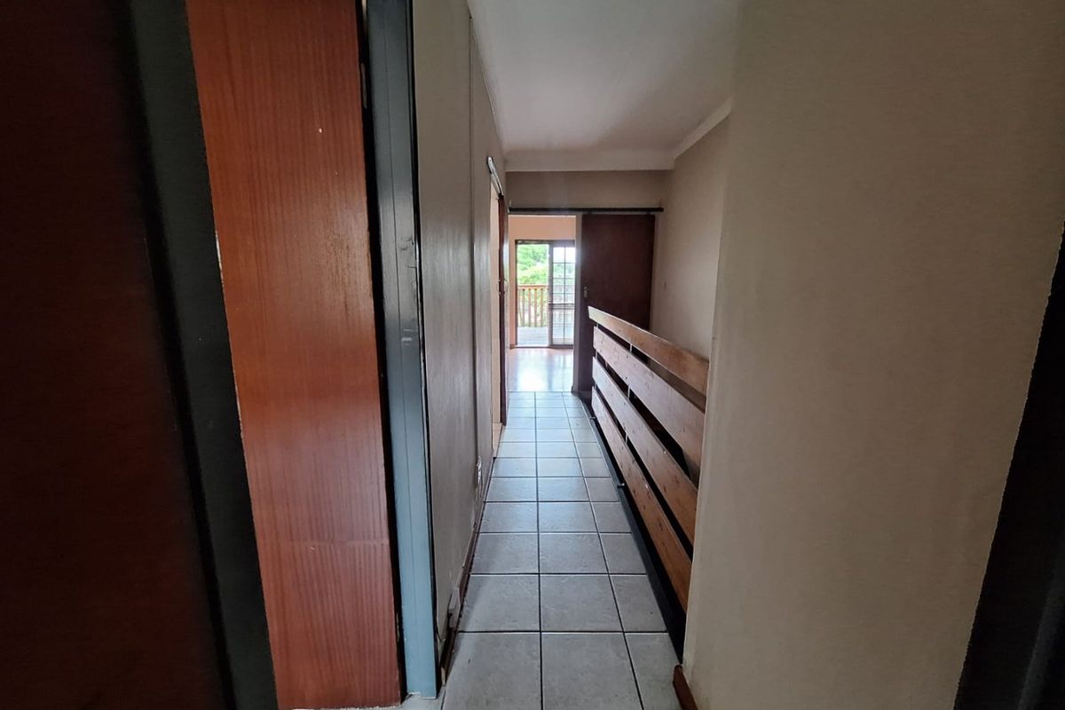 Tranquil 3-Bedroom Duplex in Beautiful Tree-Filled Complex | Deceased Estate Opportunity - Photo 3