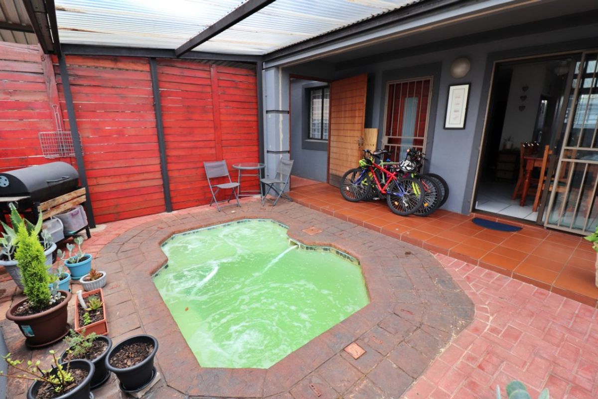 Secure, Family-Friendly Cluster with Entertainment Appeal - Photo 4