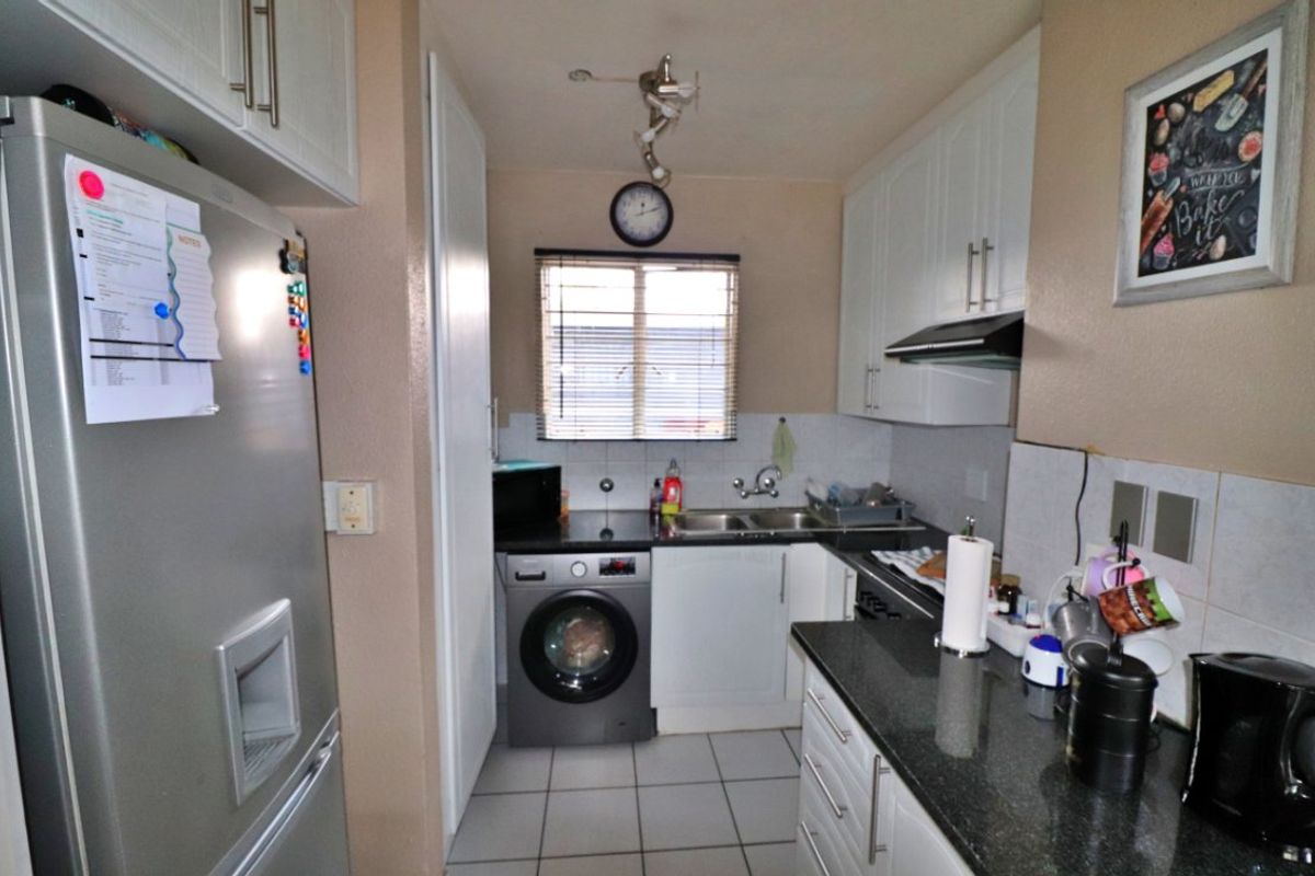 Secure, Family-Friendly Cluster with Entertainment Appeal - Photo 3