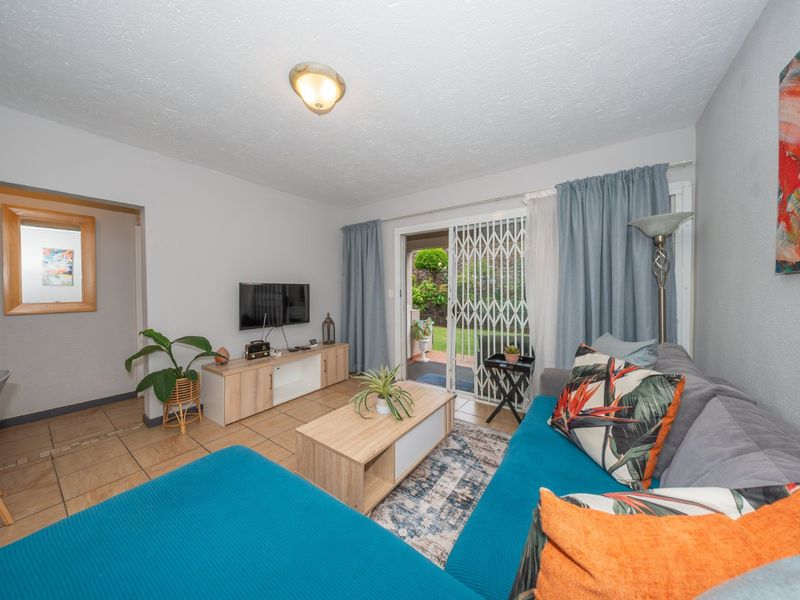 Immaculate Garden Townhouse Offering Secure Lock Up and Go Living - Photo 9