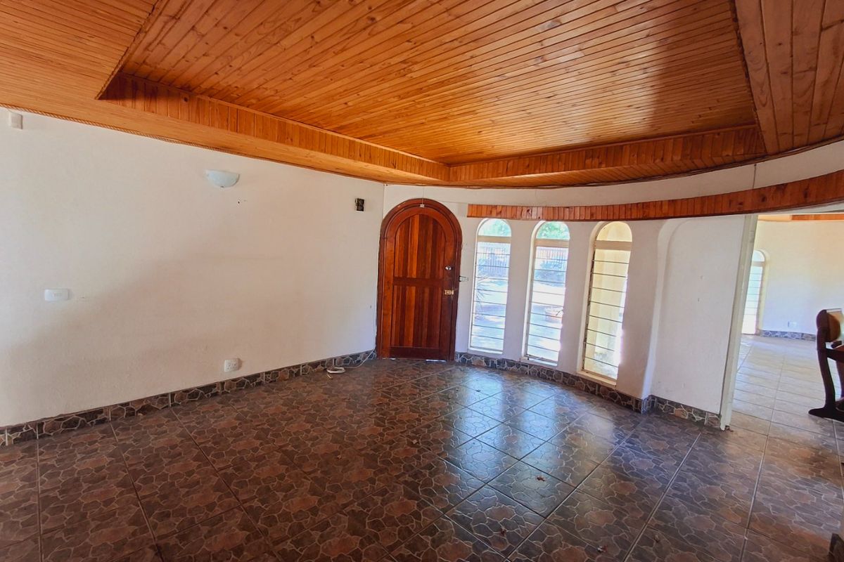 "4-bedroom home within walking distance to a popular high school, with lots of potential." - Photo 2