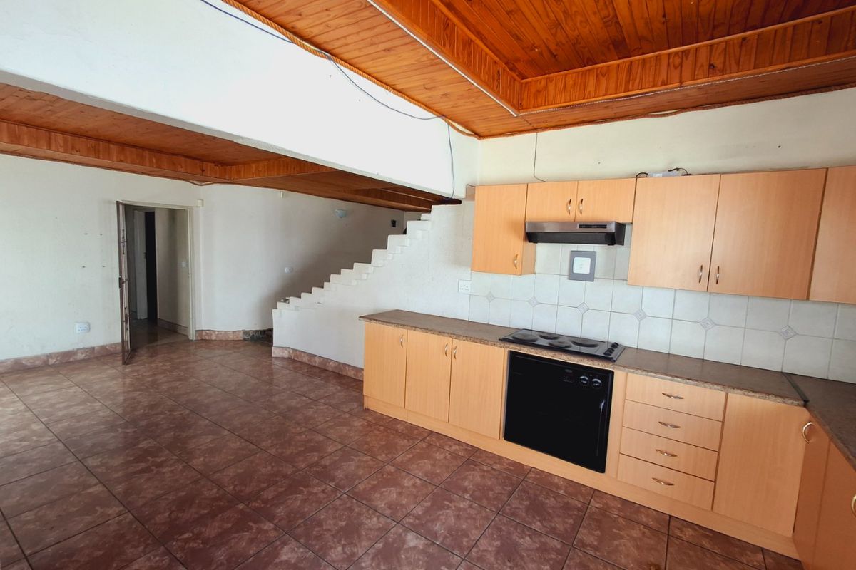 "4-bedroom home within walking distance to a popular high school, with lots of potential." - Photo 5