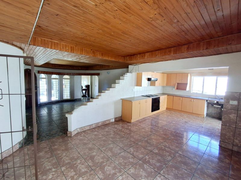 "4-bedroom home within walking distance to a popular high school, with lots of potential." - Photo 4