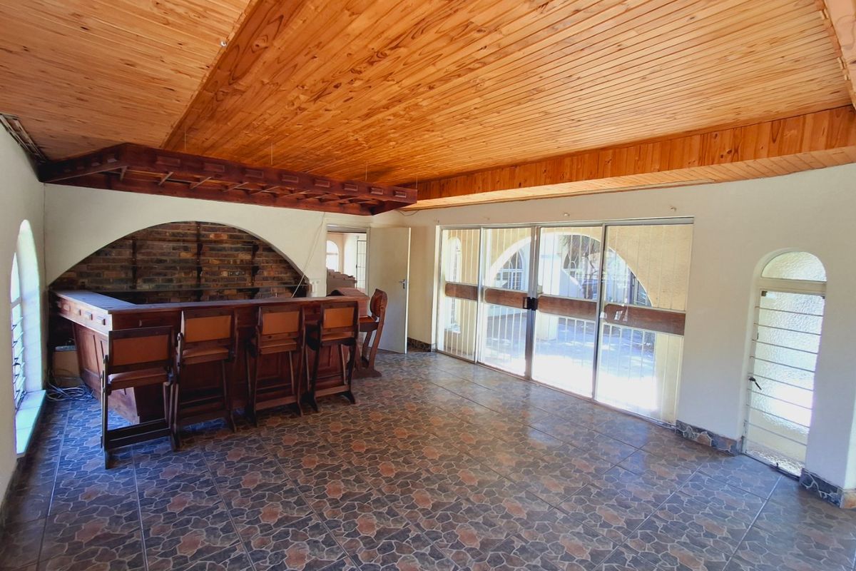 "4-bedroom home within walking distance to a popular high school, with lots of potential." - Photo 3