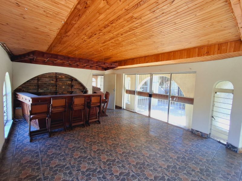 "4-bedroom home within walking distance to a popular high school, with lots of potential." - Photo 3