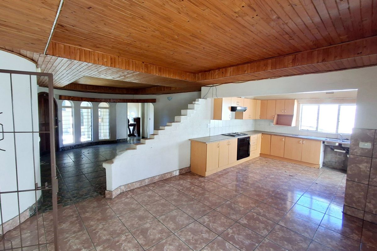 "4-bedroom home within walking distance to a popular high school, with lots of potential." - Photo 4