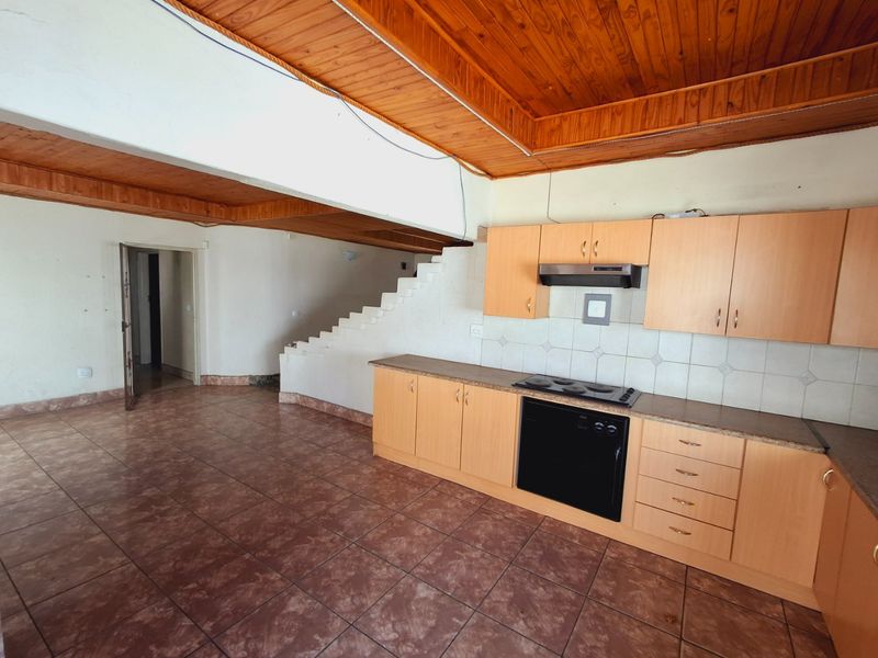 "4-bedroom home within walking distance to a popular high school, with lots of potential." - Photo 5