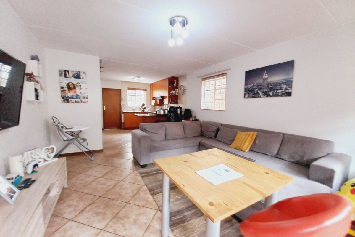 Charming 2-Bedroom Duplex Offering Private Garden Living in a Secure Complex - Photo 3