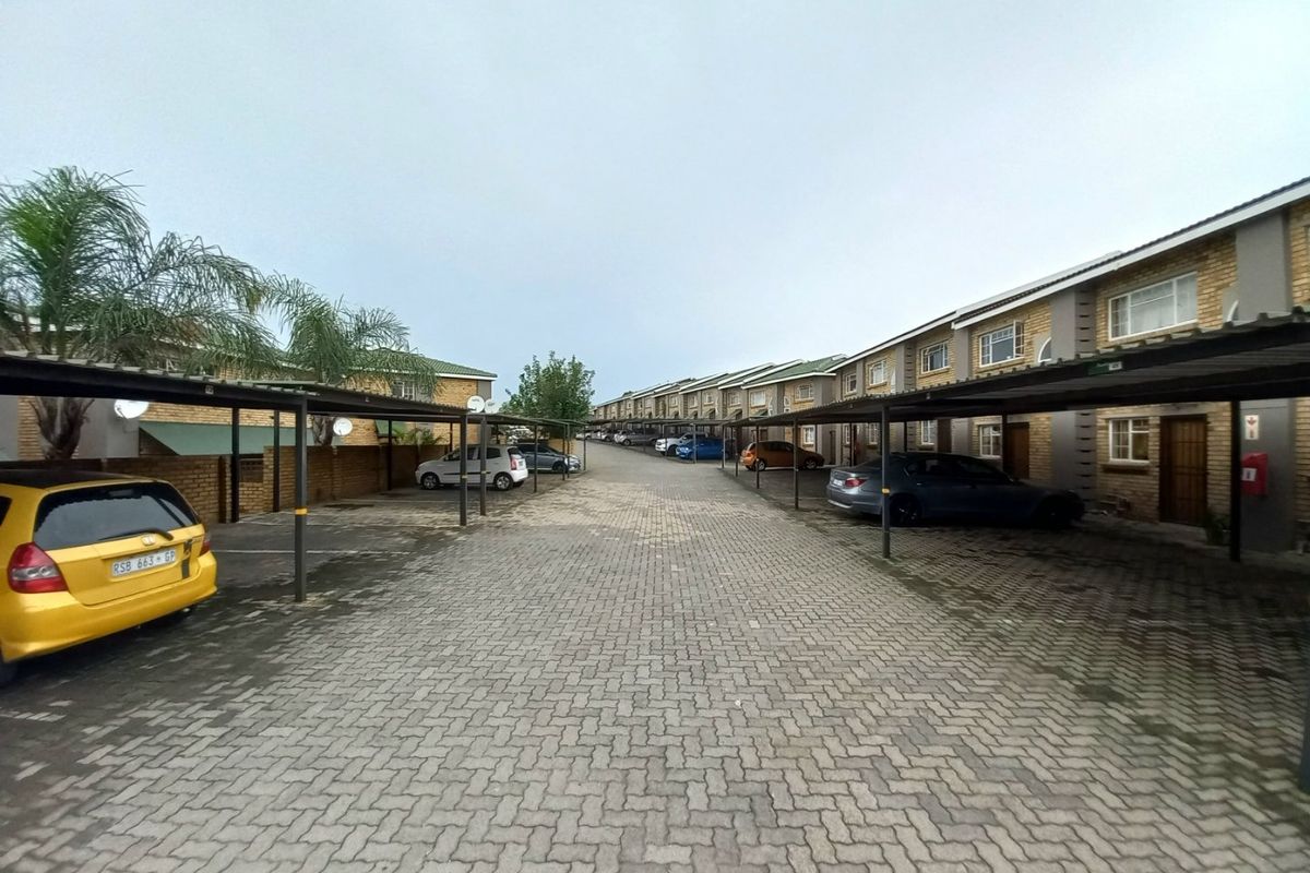 Charming 2-Bedroom Duplex Offering Private Garden Living in a Secure Complex - Photo 2