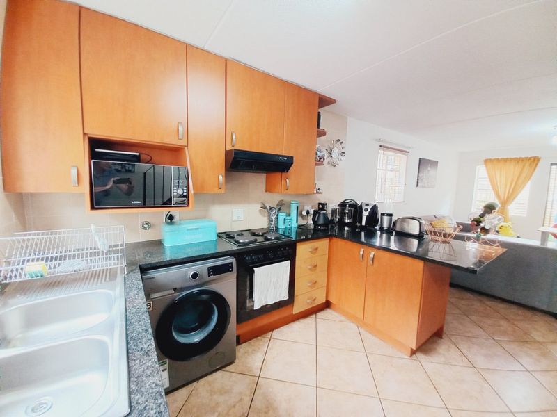 Charming 2-Bedroom Duplex Offering Private Garden Living in a Secure Complex - Photo 6