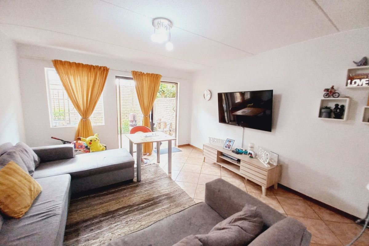 Charming 2-Bedroom Duplex Offering Private Garden Living in a Secure Complex - Photo 4