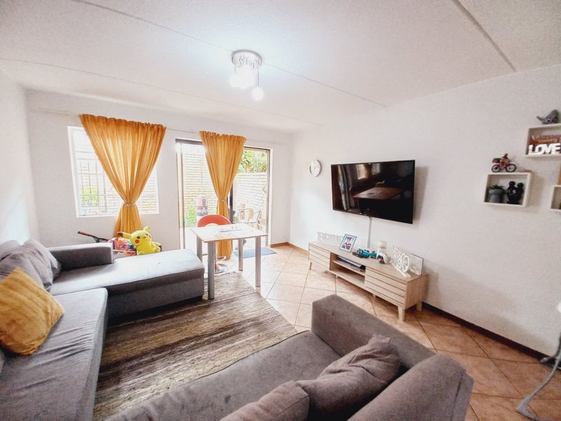 Charming 2-Bedroom Duplex Offering Private Garden Living in a Secure Complex - Photo 4