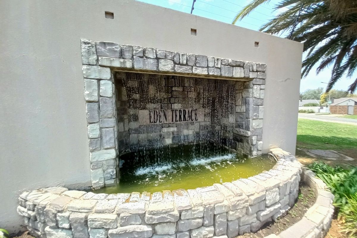 This neat and cozy ground-floor townhouse offers secure, low-maintenance living in the popular Eden Terrace complex. - Photo 3