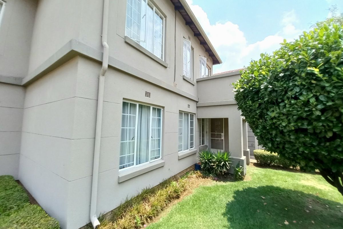 This neat and cozy ground-floor townhouse offers secure, low-maintenance living in the popular Eden Terrace complex. - Photo 2