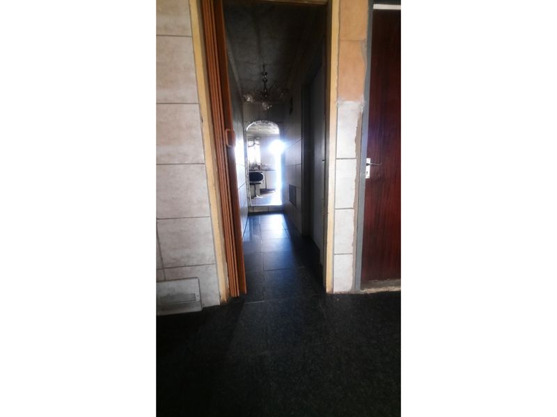 Income-Generating 3-Bedroom Property with 3 Outside Rooms - Photo 9