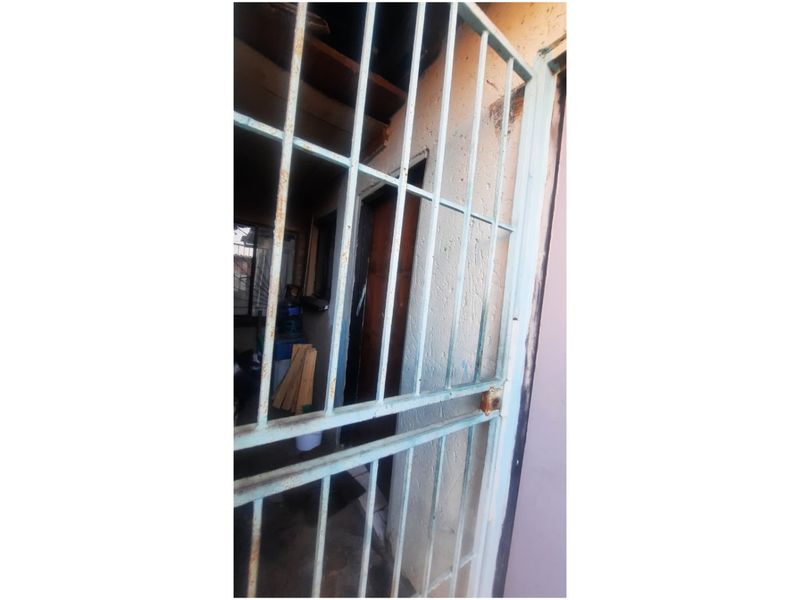 Income-Generating 3-Bedroom Property with 3 Outside Rooms - Photo 7