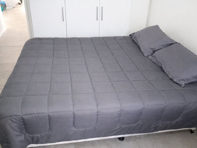 A 2-Bedroom with 1-Bathroom ,Kitchen and a Living room - Photo 9