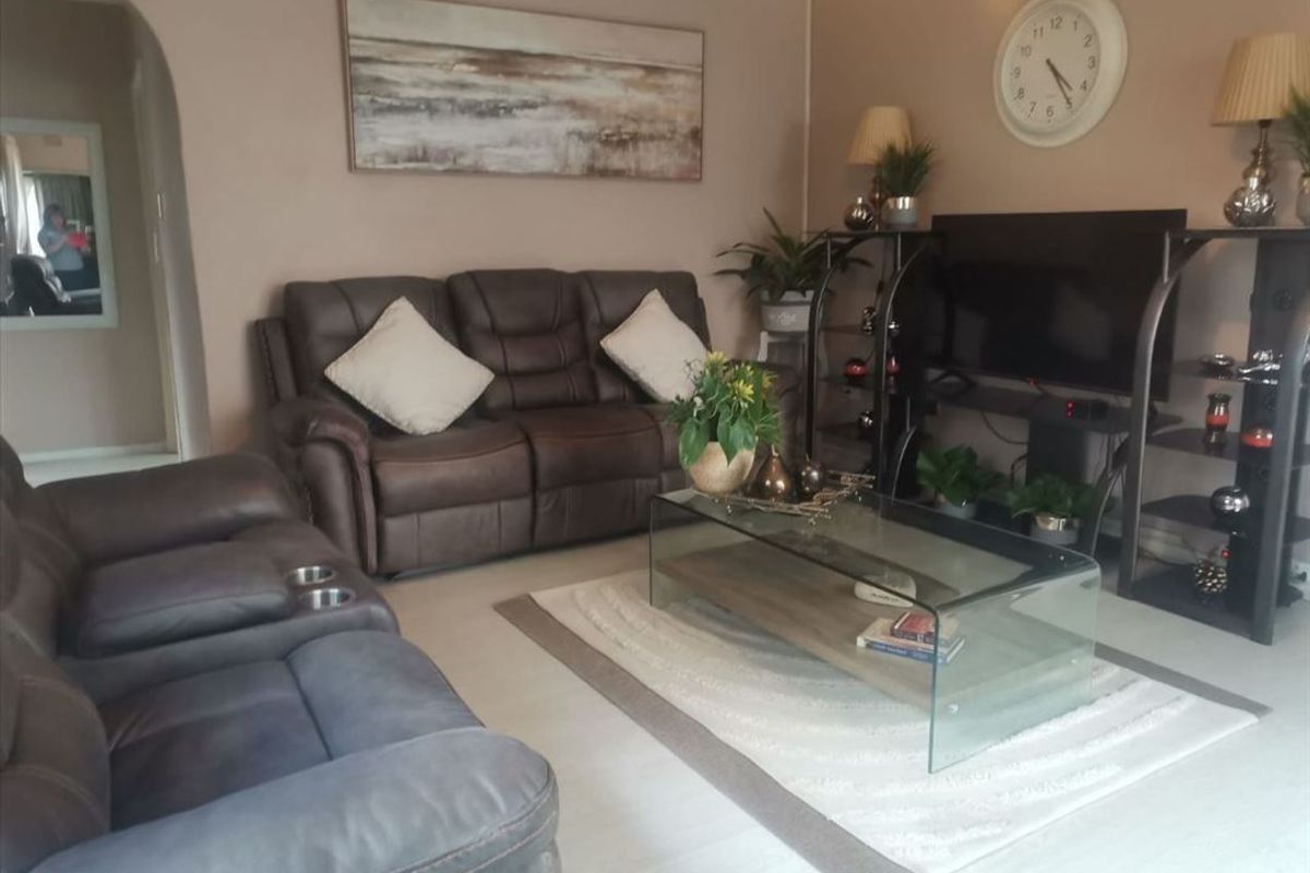 Modern Three-Bedroom Home with Pool and Dual Living Areas - Photo 2