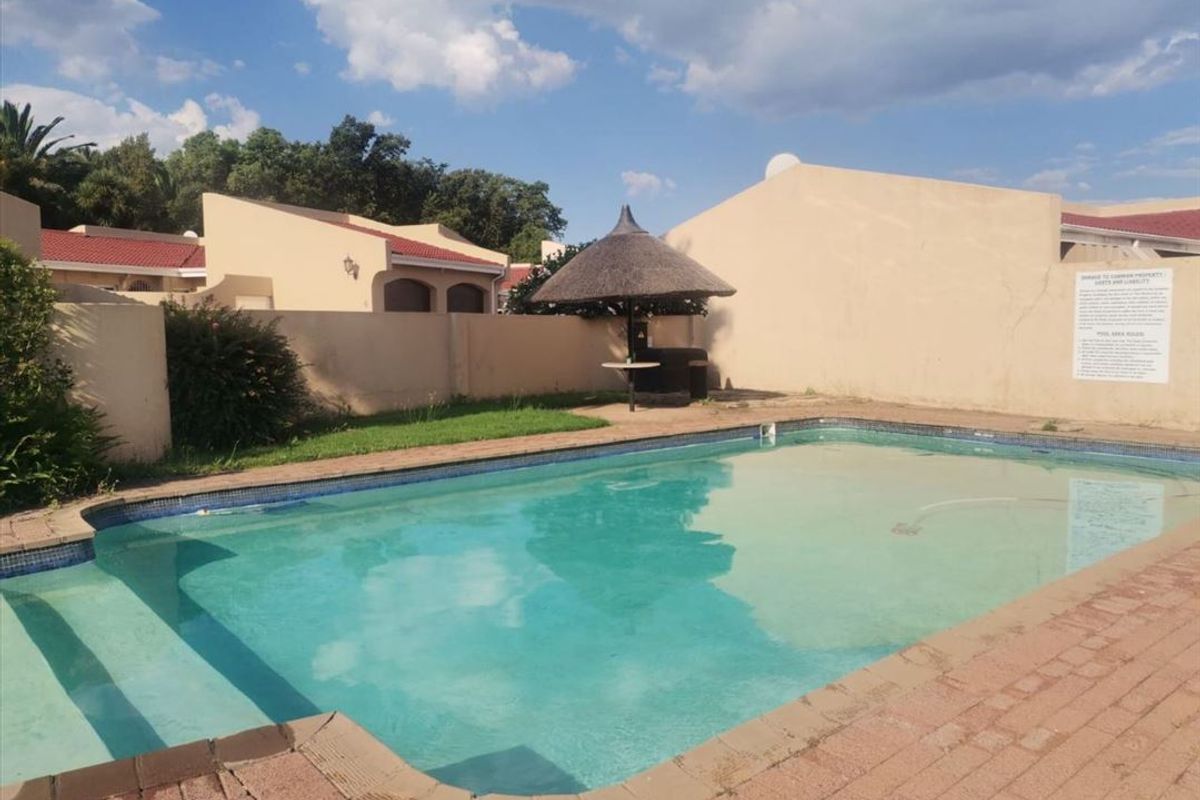 Modern Three-Bedroom Home with Pool and Dual Living Areas - Photo 3