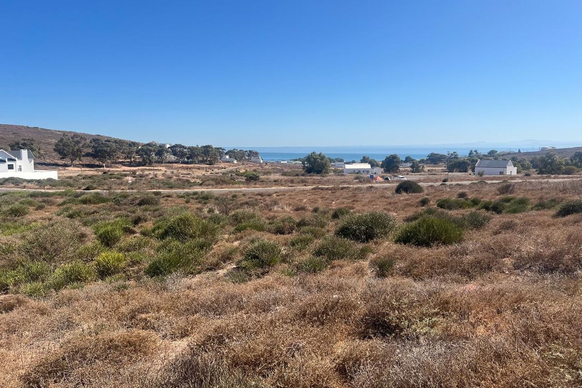 A scenic view of the coastal landscape and surrounding area from the vacant residential land plot.