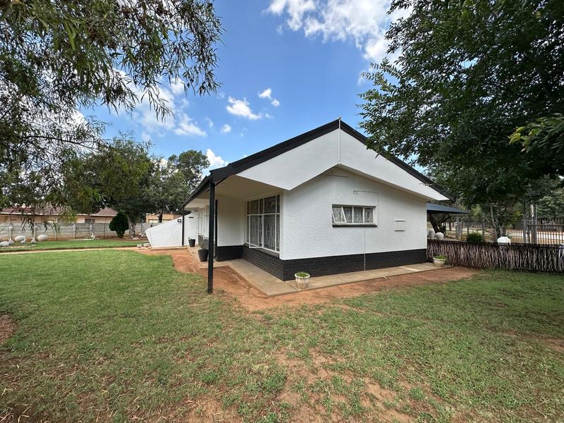 Modern, Secure Family Home with Solar Power in Prime Wolmaransstad Location - Photo 6