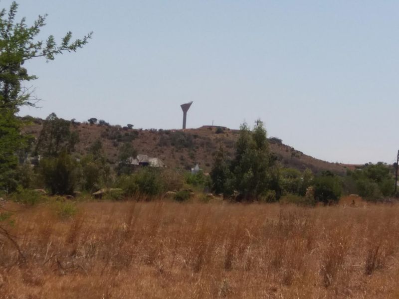 A view of the surrounding landscape and hillside from the vacant residential land.