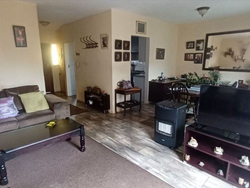 Elegant Two-Bedroom Home with Guest Loo and Secure Parking - Photo 2