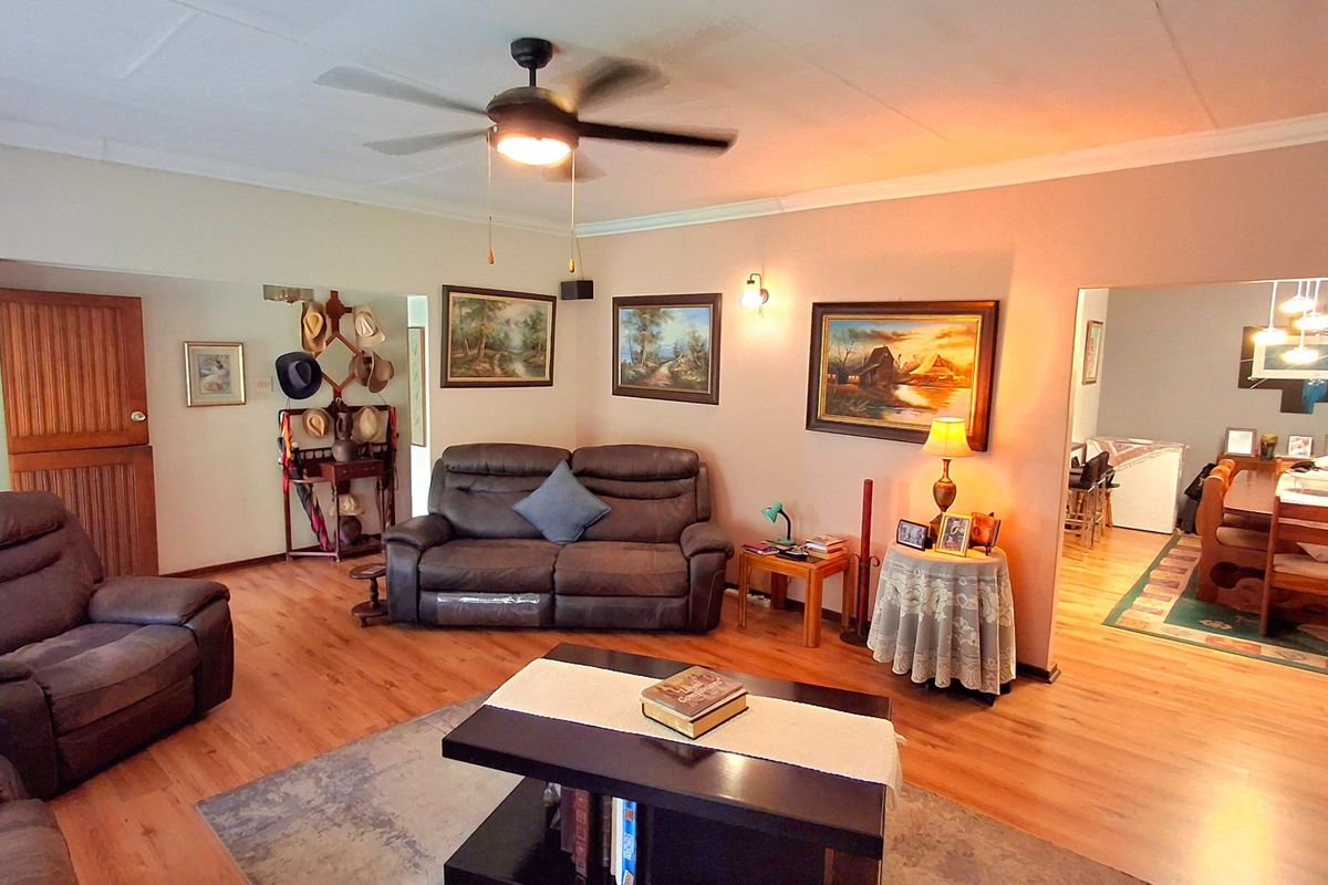 Beautiful 4-Bedroom Family Home with Solar Inverter & Income-Generating Flatlet in Sasolburg - Photo 3