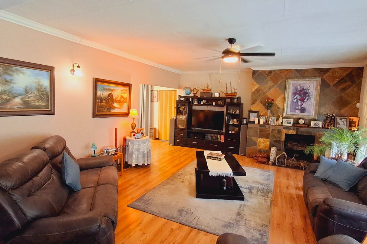 Beautiful 4-Bedroom Family Home with Solar Inverter & Income-Generating Flatlet in Sasolburg - Photo 4