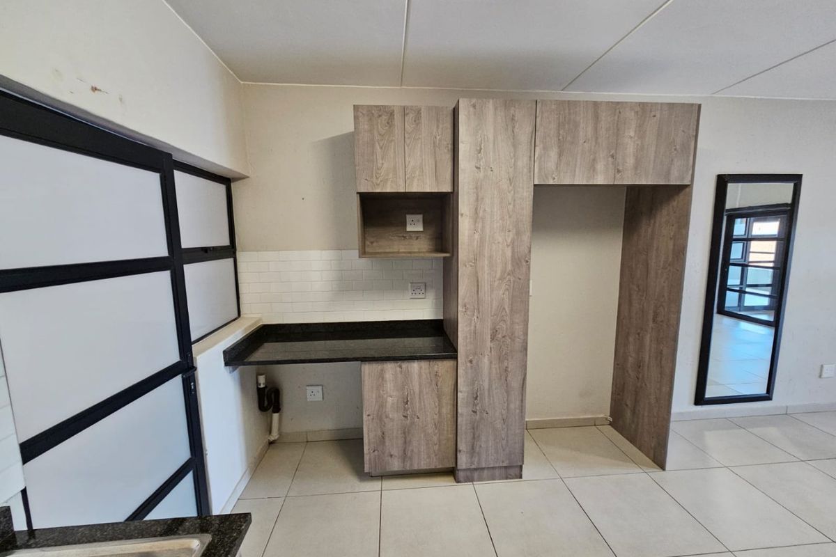 A 3-Bedroom and 2-Bathroom with Kitchen and Living room - Photo 2
