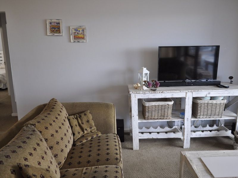 Secure, Scenic & Effortlessly Comfortable Coastal Living - Photo 5