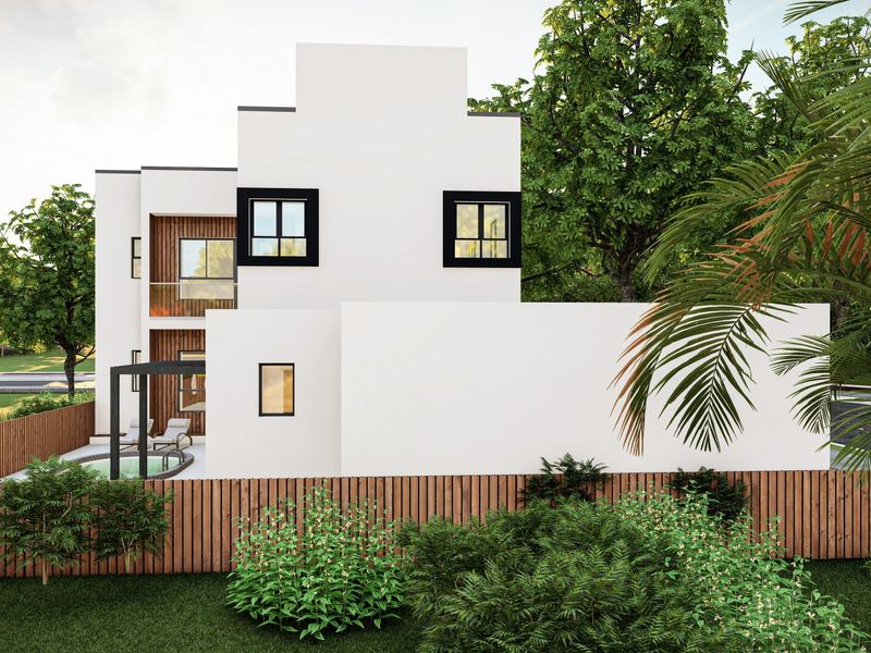 A modern two-story residential exterior featuring a clean white facade, black window frames, a private swimming pool, and a timber fence.