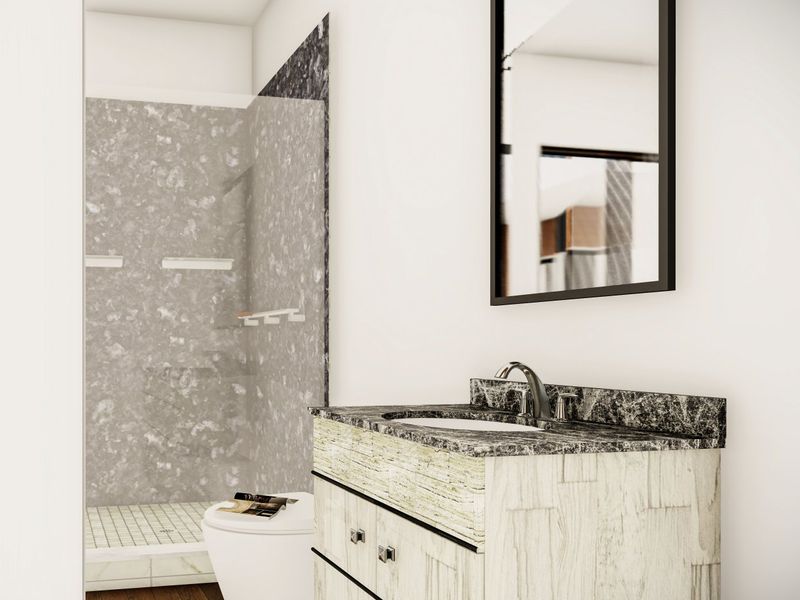 Modern bathroom featuring a vanity with stone countertop, undermount sink, wall mirror, and a spacious walk-in shower with tiled surround.
