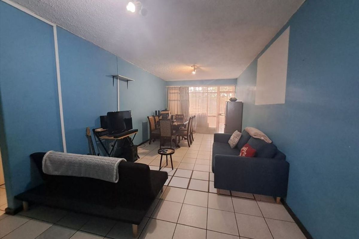 Cozy Two-Bedroom Home with Practical Design - Photo 2