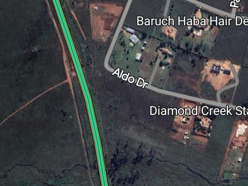 An aerial satellite view showing the residential land layout, surrounding road network, and local neighborhood context.