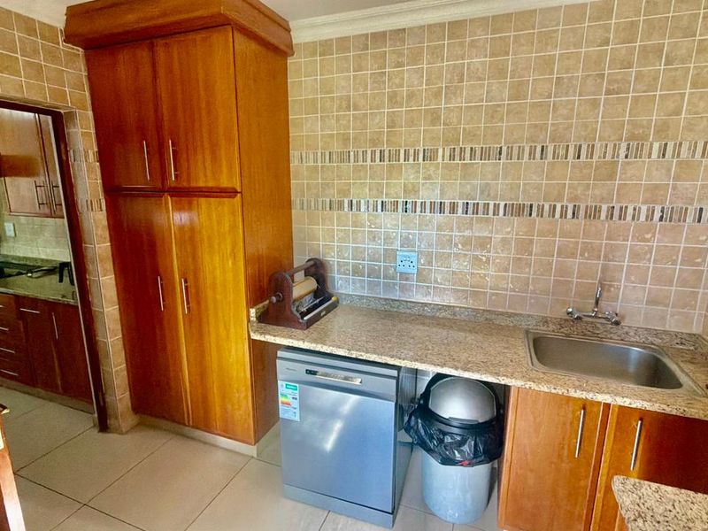 Elegant 3-Bedroom Home in Exclusive Security Estate - Photo 10