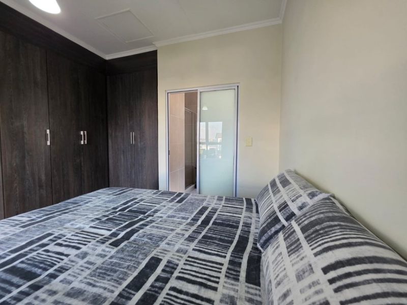 Modern 1-Bedroom Flat with Stunning Balcony Views!  - Photo 9