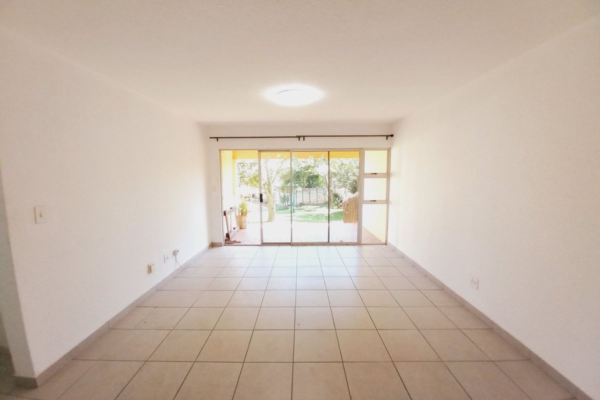 Secure and Immaculate Two-Bedroom Townhouse Offering Lifestyle Living at Eagles Nest - Photo 4