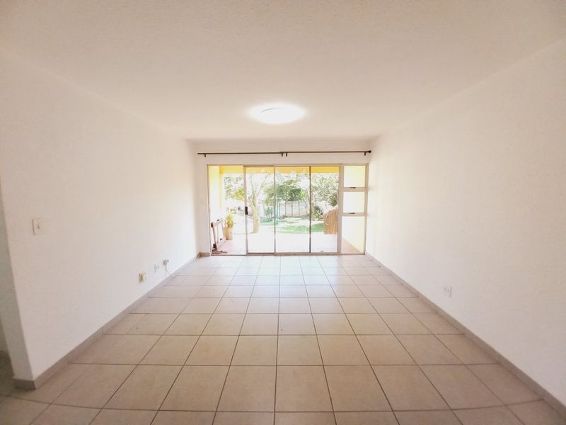 Secure and Immaculate Two-Bedroom Townhouse Offering Lifestyle Living at Eagles Nest - Photo 4