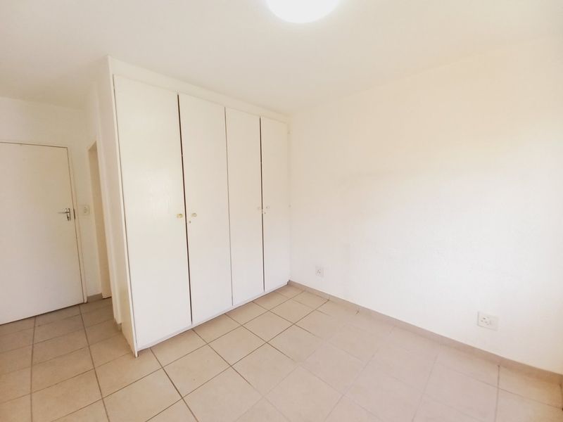 Secure and Immaculate Two-Bedroom Townhouse Offering Lifestyle Living at Eagles Nest - Photo 9