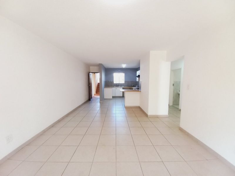 Secure and Immaculate Two-Bedroom Townhouse Offering Lifestyle Living at Eagles Nest - Photo 8